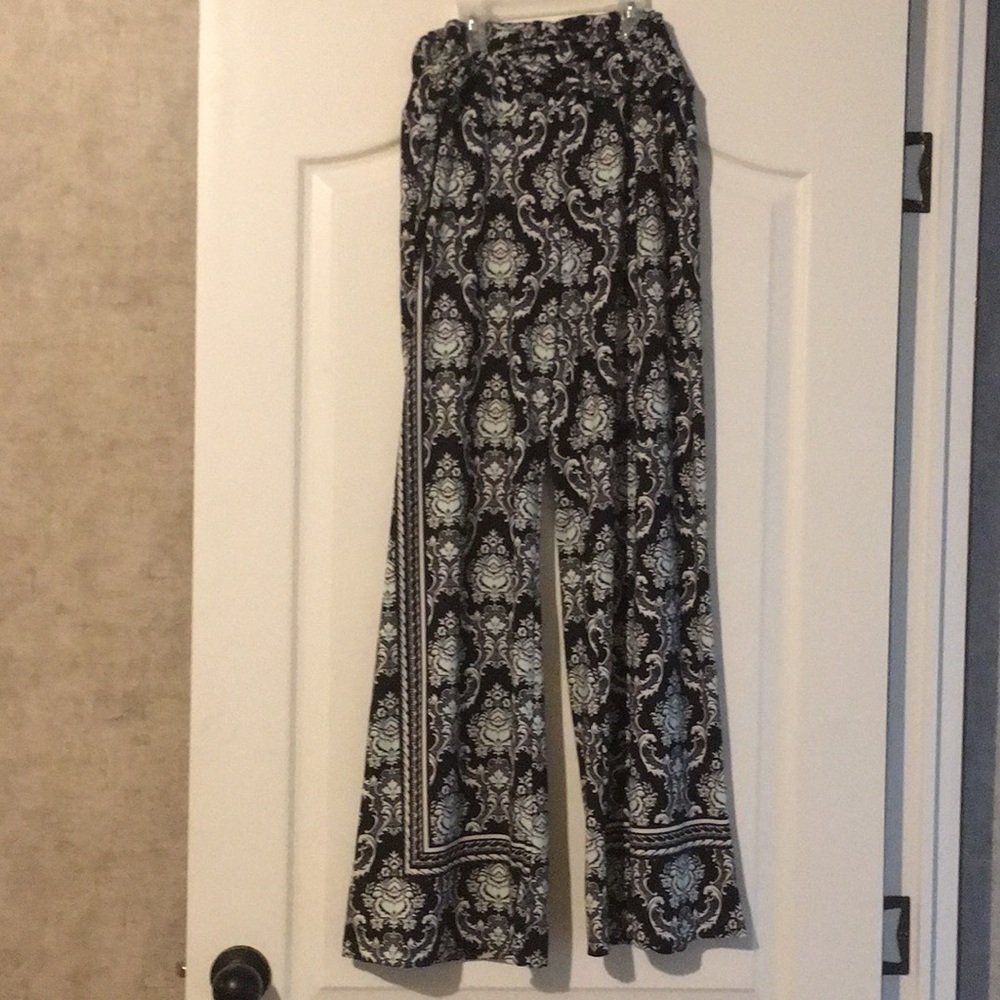 Black and white dress pants with tortoise designs